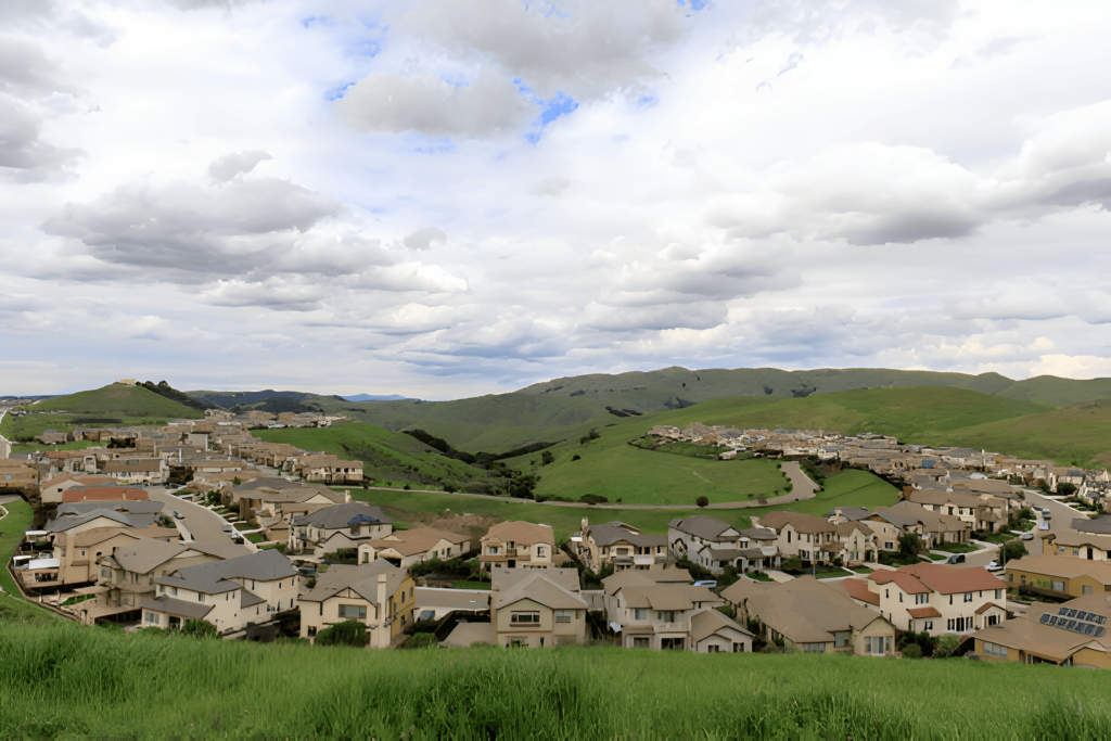 A panoramic hilltop view of residential homes in Dublin, California, showcasing a well-planned suburban community.