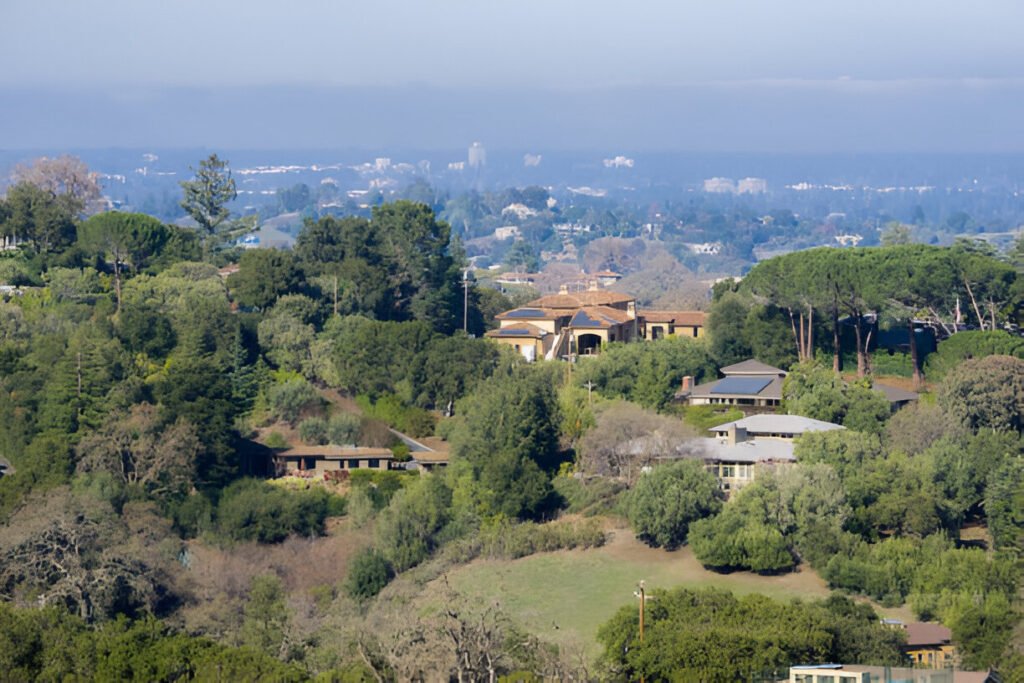 Scenic view of homes in Los Altos Hills, with Mountain View and the San Francisco Bay in the background.